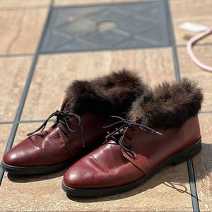 red-brown loafers with rabbit fur trim